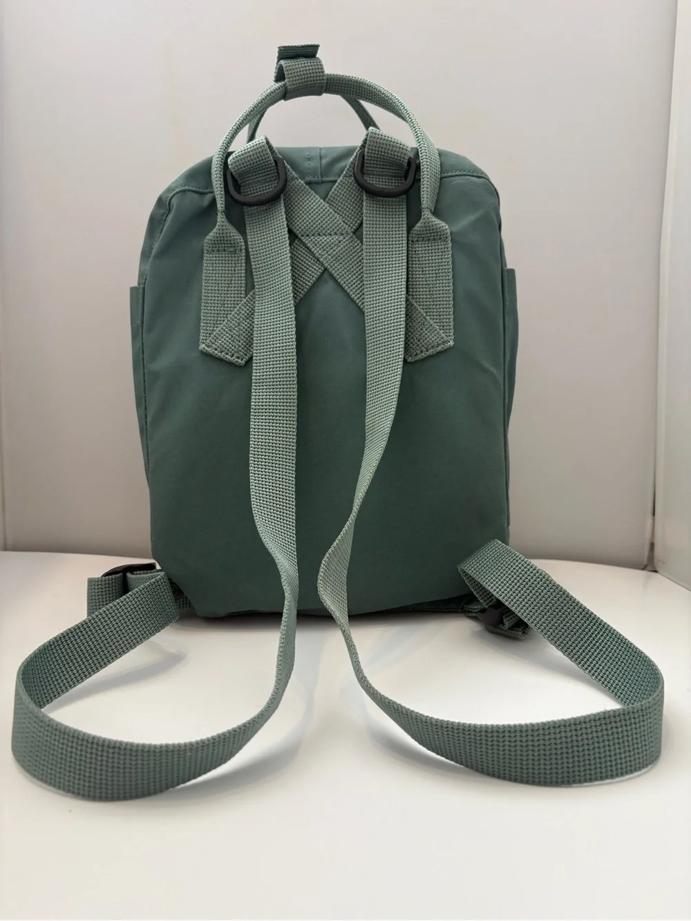 Fjallraven Kanken Mini Backpack in Sage Green with Red Logo